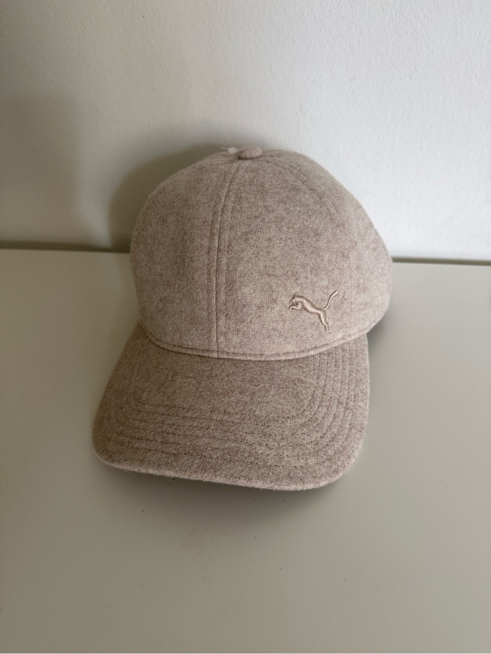 Puma hat Ivory wool-like texture